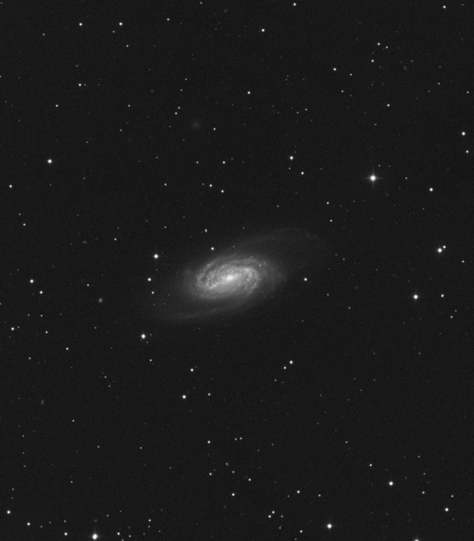  A barred spiral galaxy about 30 million light-years away in the constellation Leo.  Taken 2014-03-06 with T24, a Planewave 24"  CDK located under the Californian skies deep in the foothills of the Rocky Mountains.