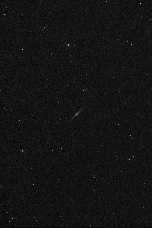 An edge-on spiral galaxy about 30 to 50 million light-years away.   Taken 2014-03-06 with T16, a Takahashi TOA-150, a wide - medium deep field telescope. This hybrid science/imaging platform located at AstroCamp Observatory in Nerpio, Spain